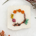Orange Floral Copper Leaf Bracelet