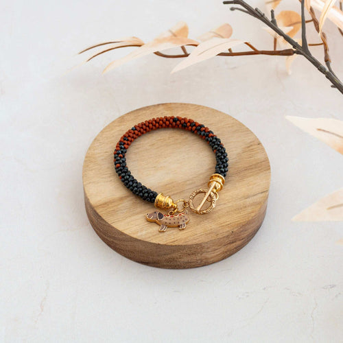 Black and Tan Kumihimo Bracelet – A Tribute to Penny