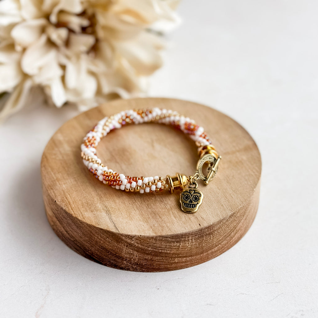 Orange and White Sugar Skull Kumihimo Bracelet